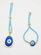 NVR Set of 2 Blue Evil Eye Bhaiya Bhabhi Wraparound Rakhi with Roli Chawal Chandan Mishri | Grocsy