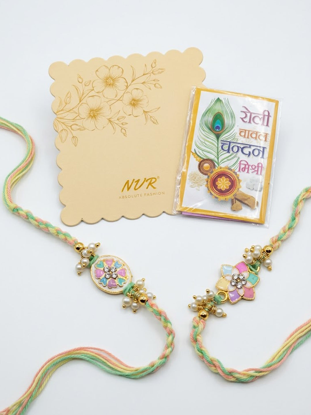 NVR Set of 2 Meenakari Floral Thread Rakhi with Roli Chawal Chandan Mishri | Grocsy