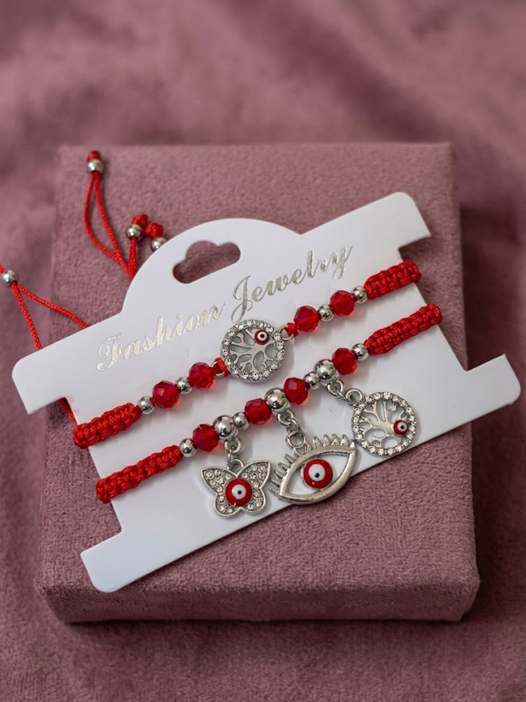 NVR Set of 2 Red & Silver Evil Eye Design Bhaiya Bhabhi Rakhi with Roli Chawal Chandan | Grocsy