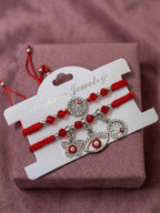 NVR Set of 2 Red & Silver Evil Eye Design Bhaiya Bhabhi Rakhi with Roli Chawal Chandan | Grocsy