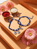 NVR Set of 2 Blue & Silver Evil Eye Design Bhaiya Bhabhi Rakhi with Roli Chawal Chandan | Grocsy