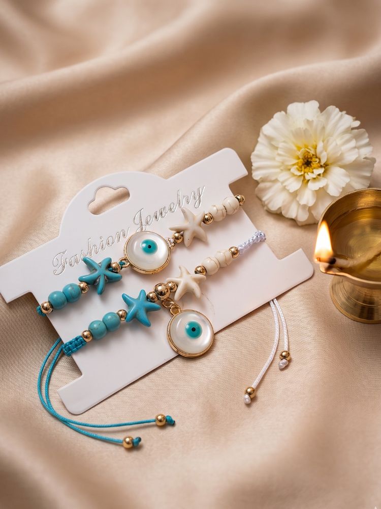 NVR Set of 2 Blue Evil Eye & White Pearl Bhaiya Bhabhi Rakhi with Roli Chawal Chandan | Grocsy