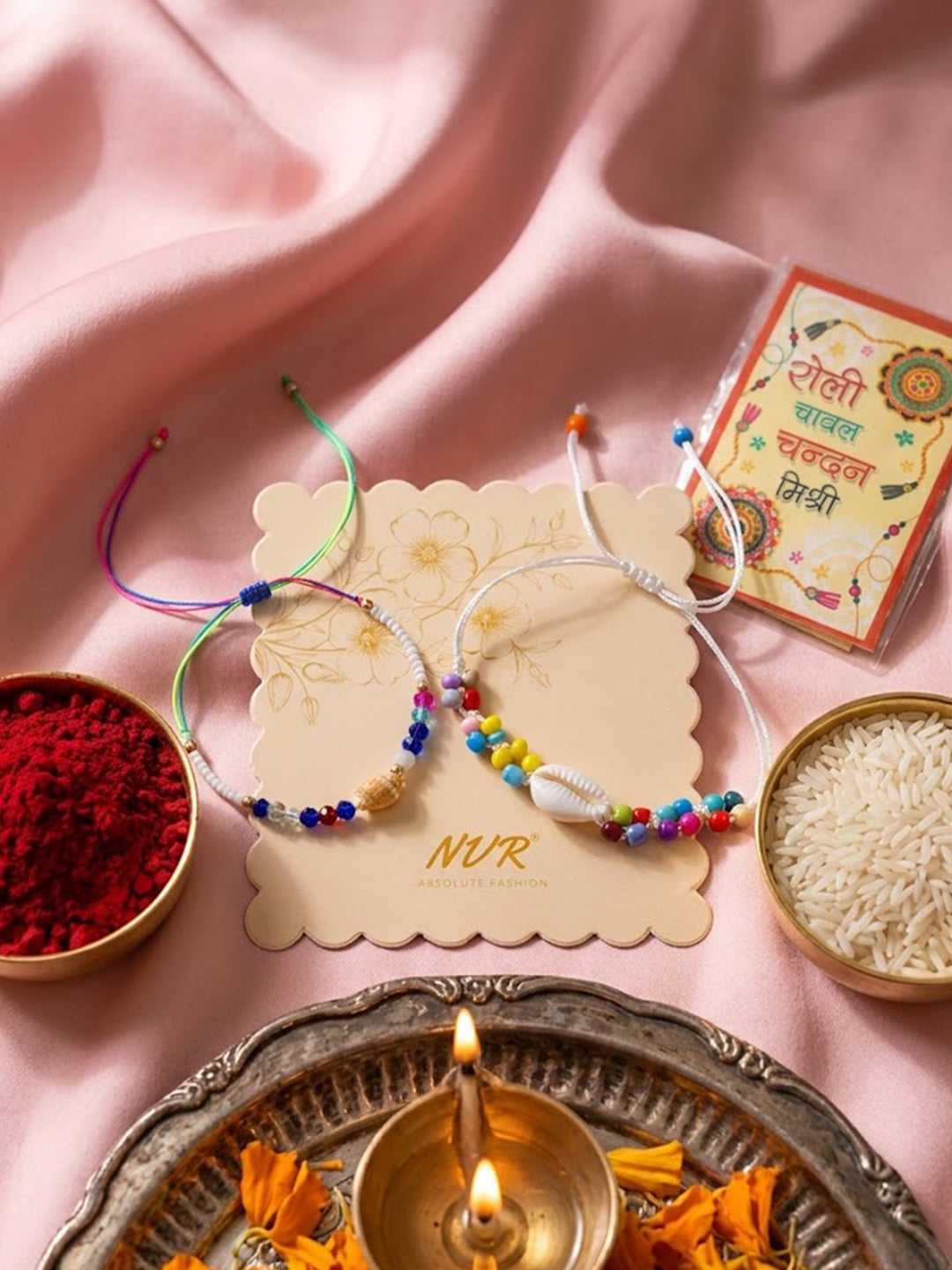 NVR Set of 2 Artificial Beads Thread Rakhi With Roli Chawal Chandan Mishri | Grocsy