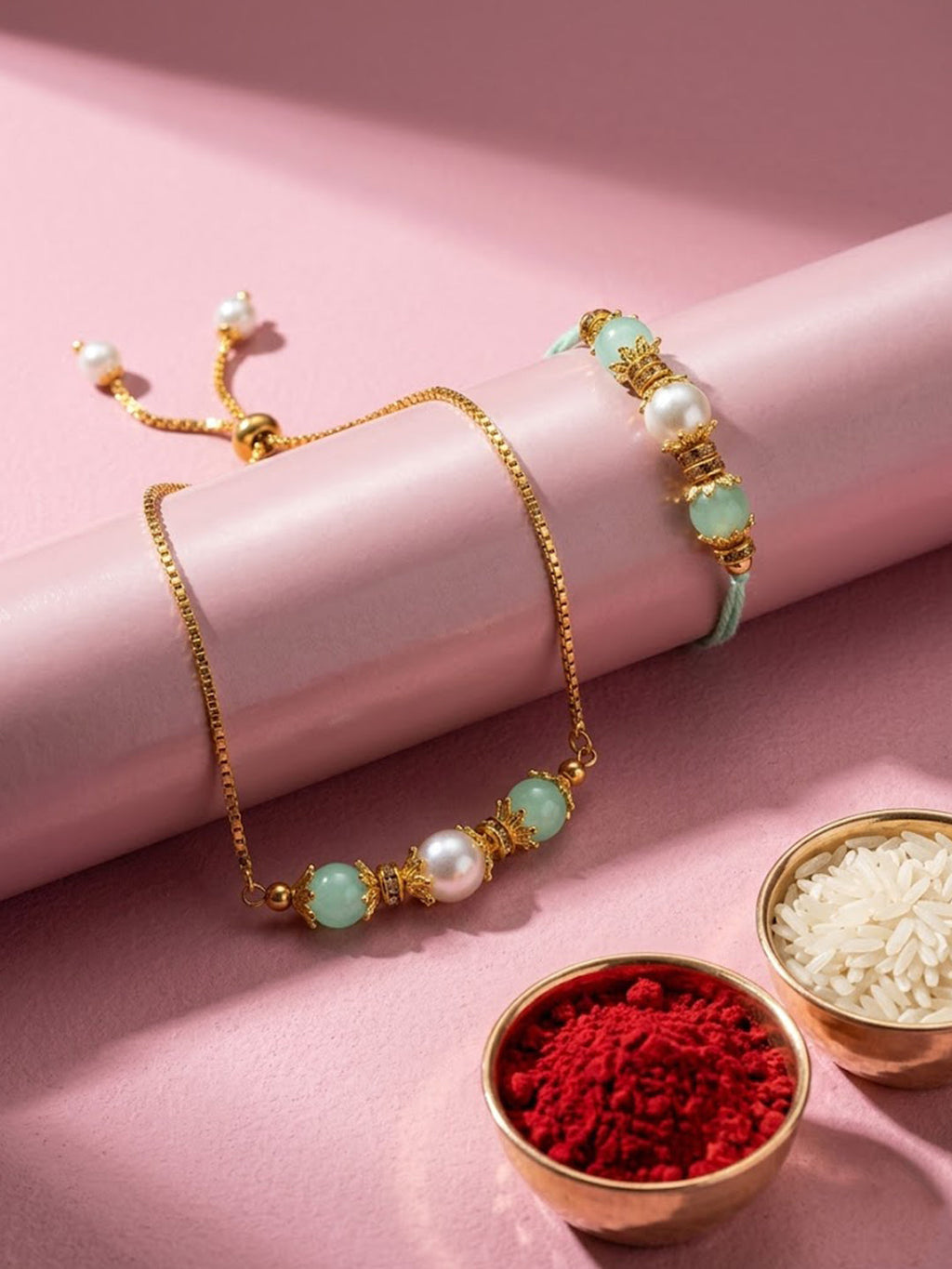 NVR Set of 2 Gold Toned Pearls & Artificial Beads Bhaiya Bhabhi Rakhi with Roli Chawal | Grocsy