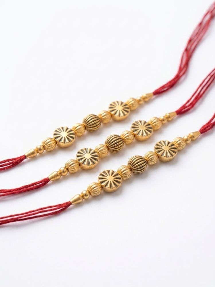 NVR Set of 3 Red & Gold Toned Artificial Stones & Beads Thread Rakhi With Roli Chawal | Grocsy