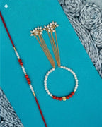 NVR Set of 2 White Pearls & Red Artificial Beads Bhaiya Bhabhi Rakhi with Roli Chawal | Grocsy