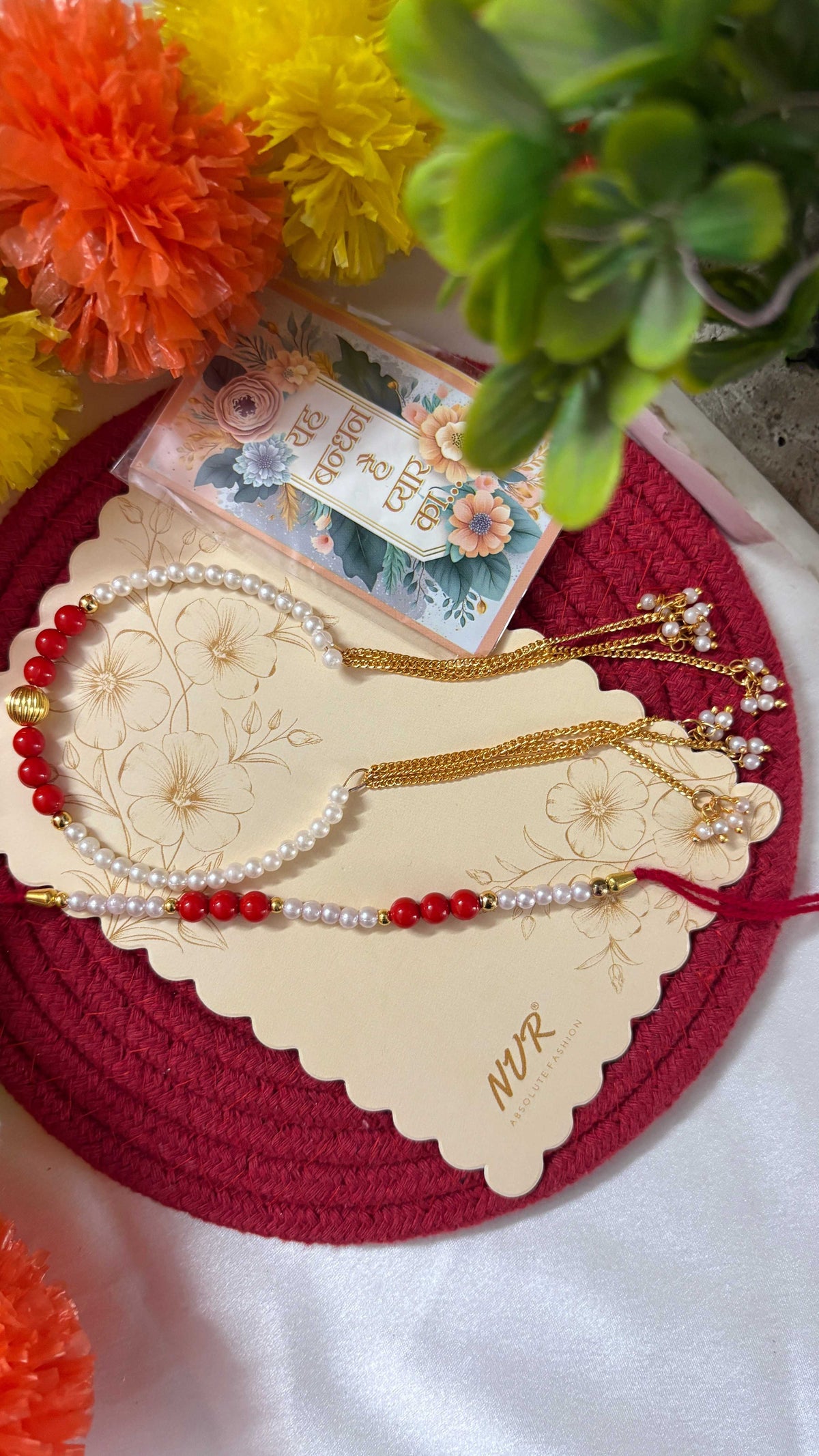 NVR Set of 2 White Pearls & Red Artificial Beads Bhaiya Bhabhi Rakhi with Roli Chawal | Grocsy