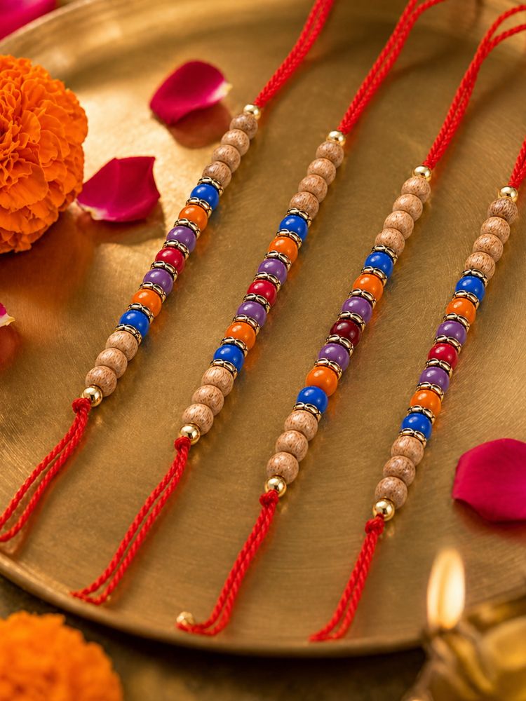 NVR Set of 4 Multicolor Circular Beads Studded Thread Rakhi with Roli Chawal Chandan | Grocsy
