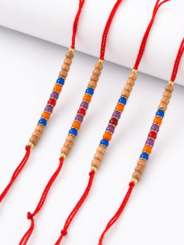 NVR Set of 4 Multicolor Circular Beads Studded Thread Rakhi with Roli Chawal Chandan | Grocsy