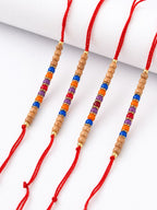 NVR Set of 4 Multicolor Circular Beads Studded Thread Rakhi with Roli Chawal Chandan | Grocsy