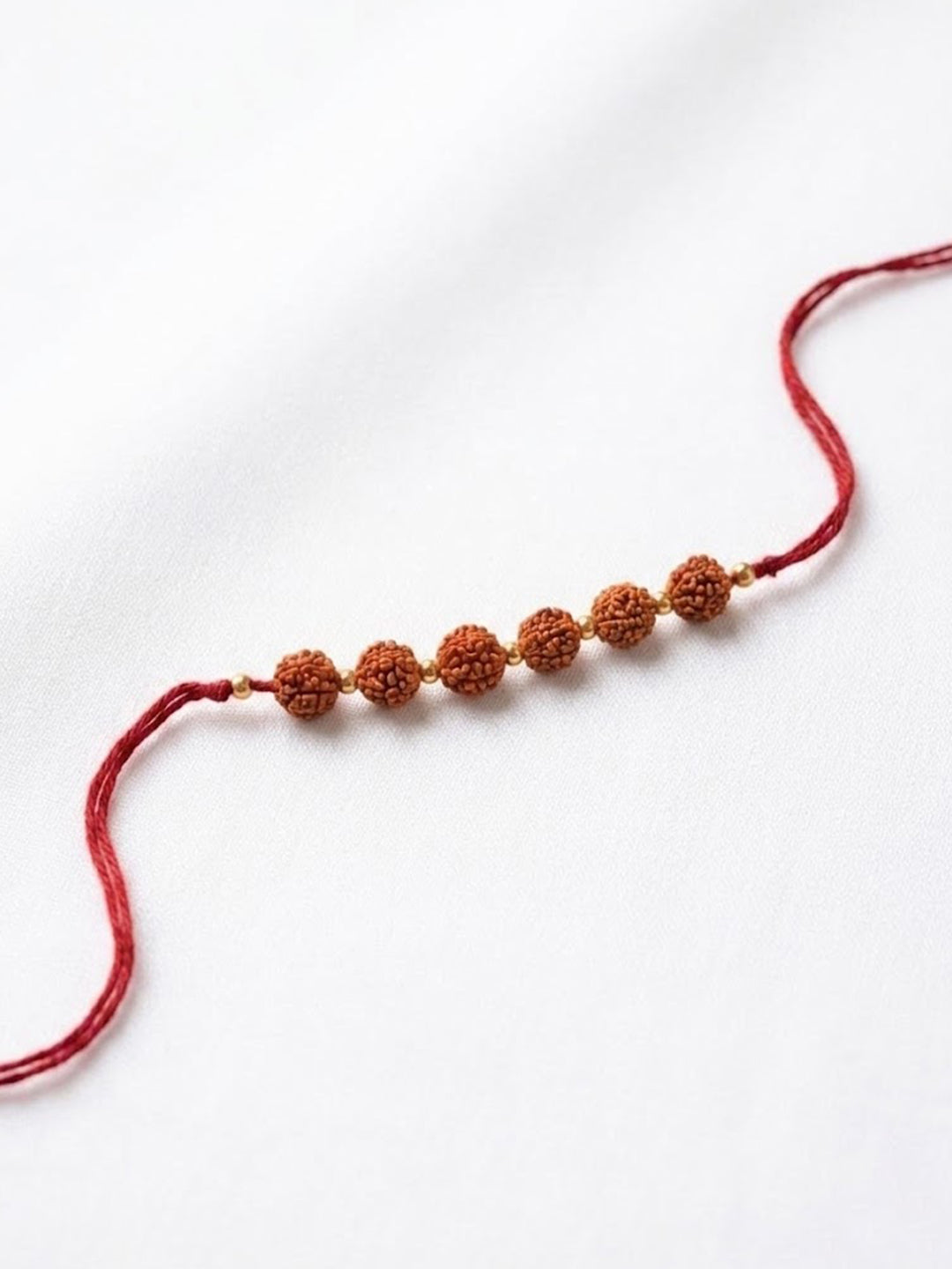 NVR Religious Rudraksh Thread Rakhi With Roli Chawal Chandan Mishri | Grocsy