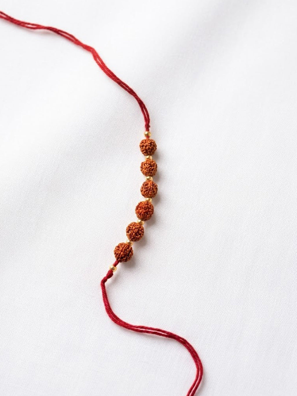 NVR Religious Rudraksh Thread Rakhi With Roli Chawal Chandan Mishri | Grocsy