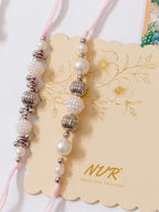 NVR Set of 3 White Pearls Thread Rakhi with Roli Chawal Chandan Mishri | Grocsy