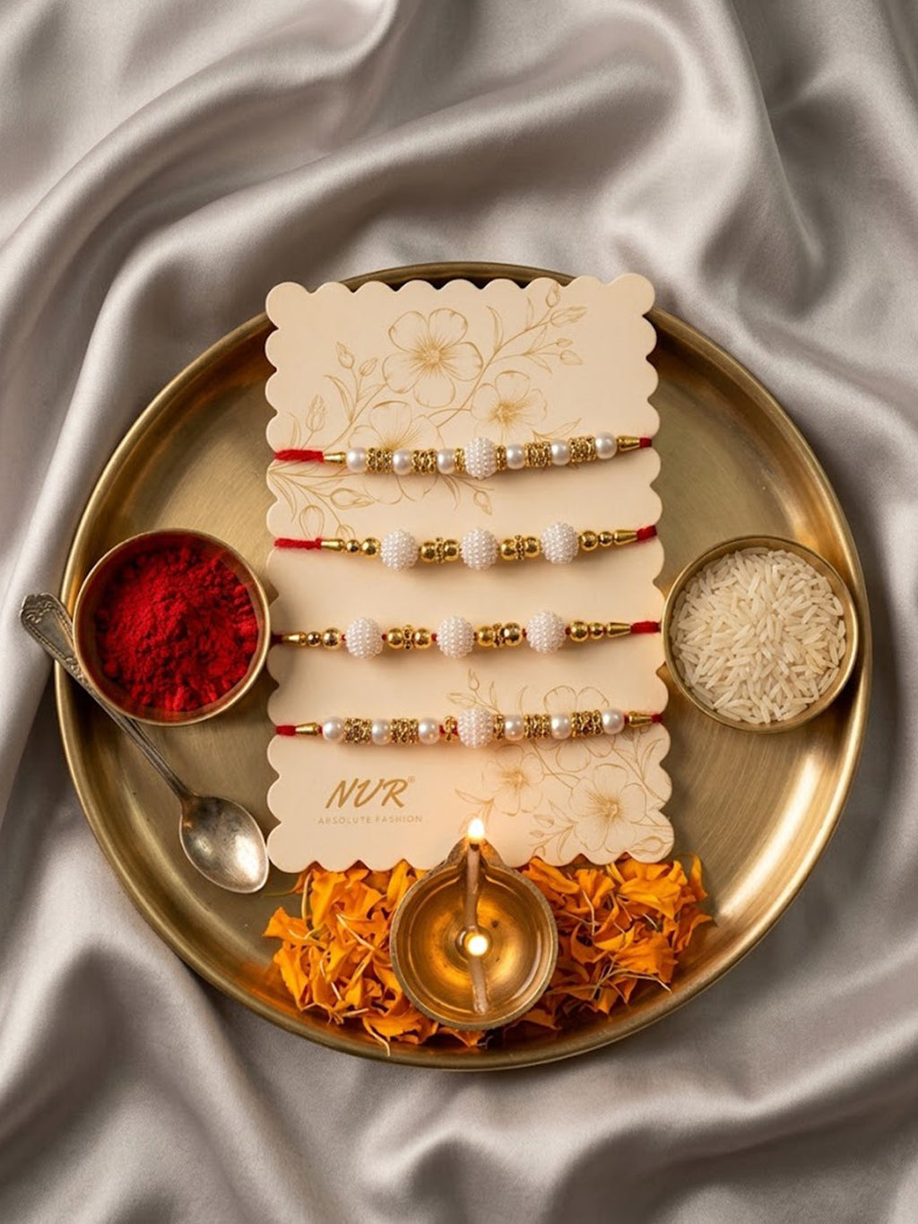 NVR Set of 4 White Pearls & Red Thread Rakhi With Roli Chawal Chandan Mishri | Grocsy