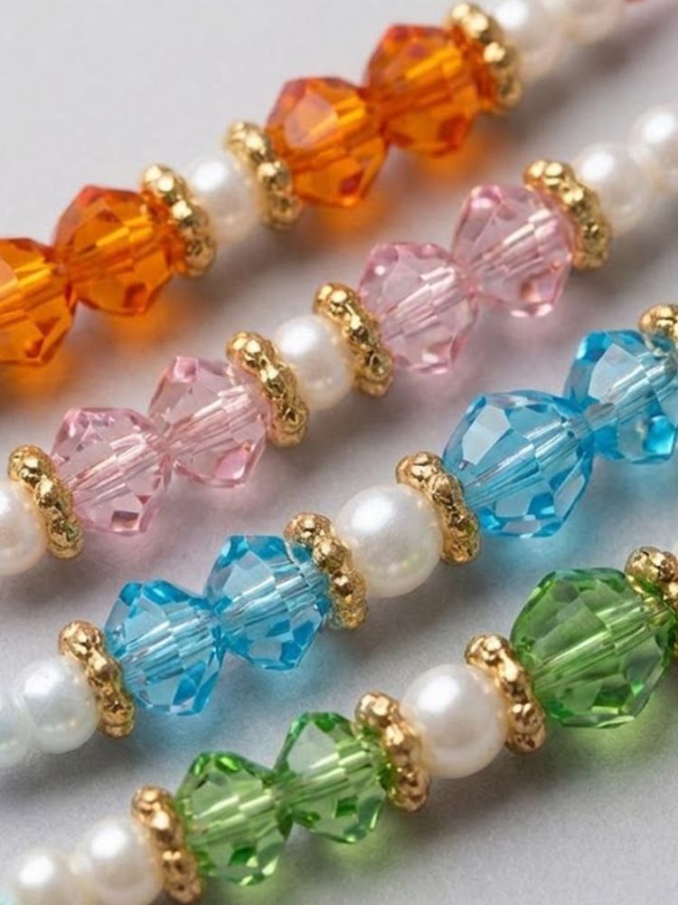 NVR Set of 4 White Pearls & Multicolor Thread Rakhi With Roli Chawal Chandan Mishri | Grocsy