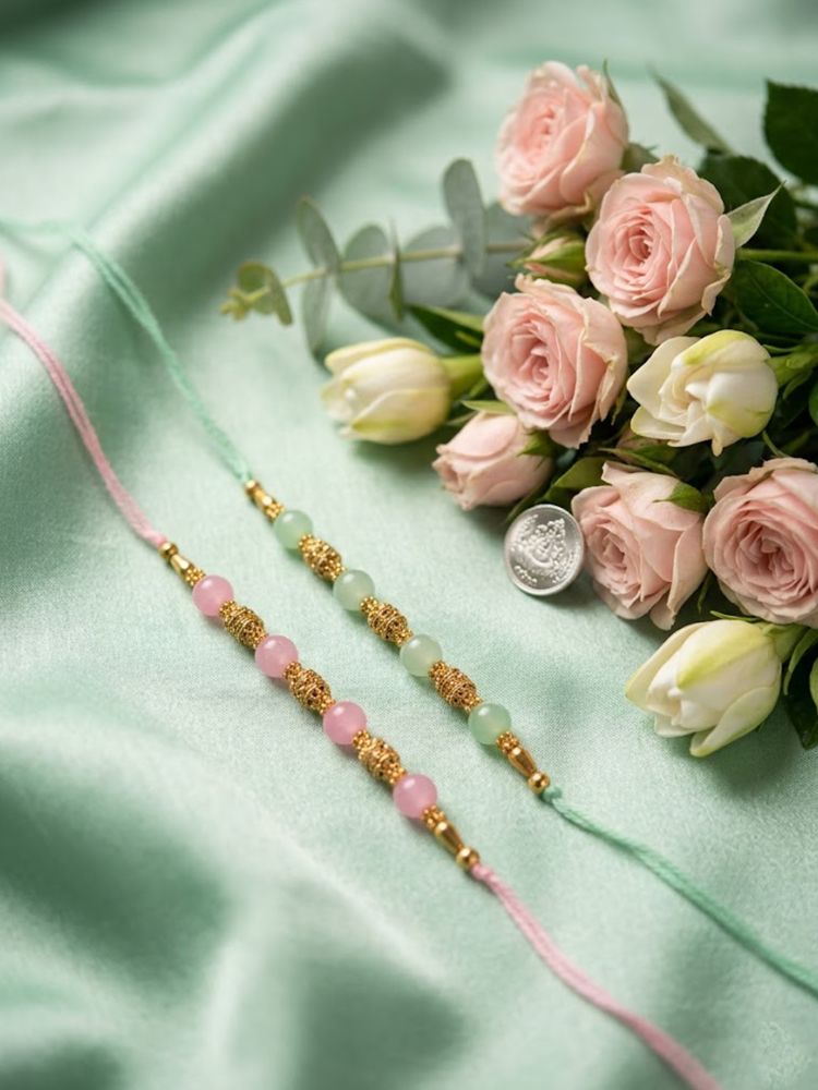 NVR Set of 2 Pink & Green Artificial Beads Thread Rakhi With Roli Chawal Chandan Mishri | Grocsy