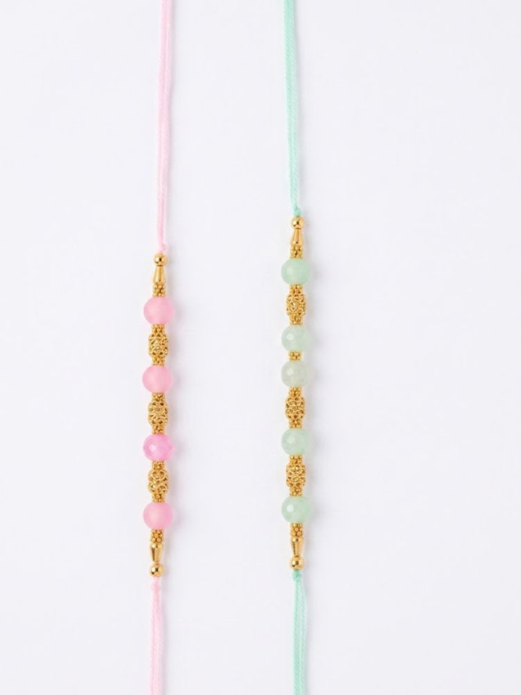 NVR Set of 2 Pink & Green Artificial Beads Thread Rakhi With Roli Chawal Chandan Mishri | Grocsy