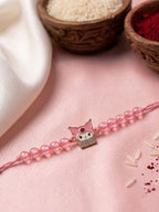NVR Pink Transparent Beaded Cartoon Character Kids Rakhi with Roli Chawal Chandan Mishri | Grocsy