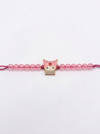 NVR Pink Transparent Beaded Cartoon Character Kids Rakhi with Roli Chawal Chandan Mishri | Grocsy