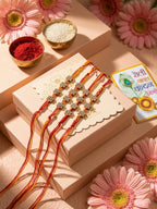 NVR Set of 4 Artificial Stones Floral Design Thread Rakhi with Roli Chawal Chandan Mishri | Grocsy