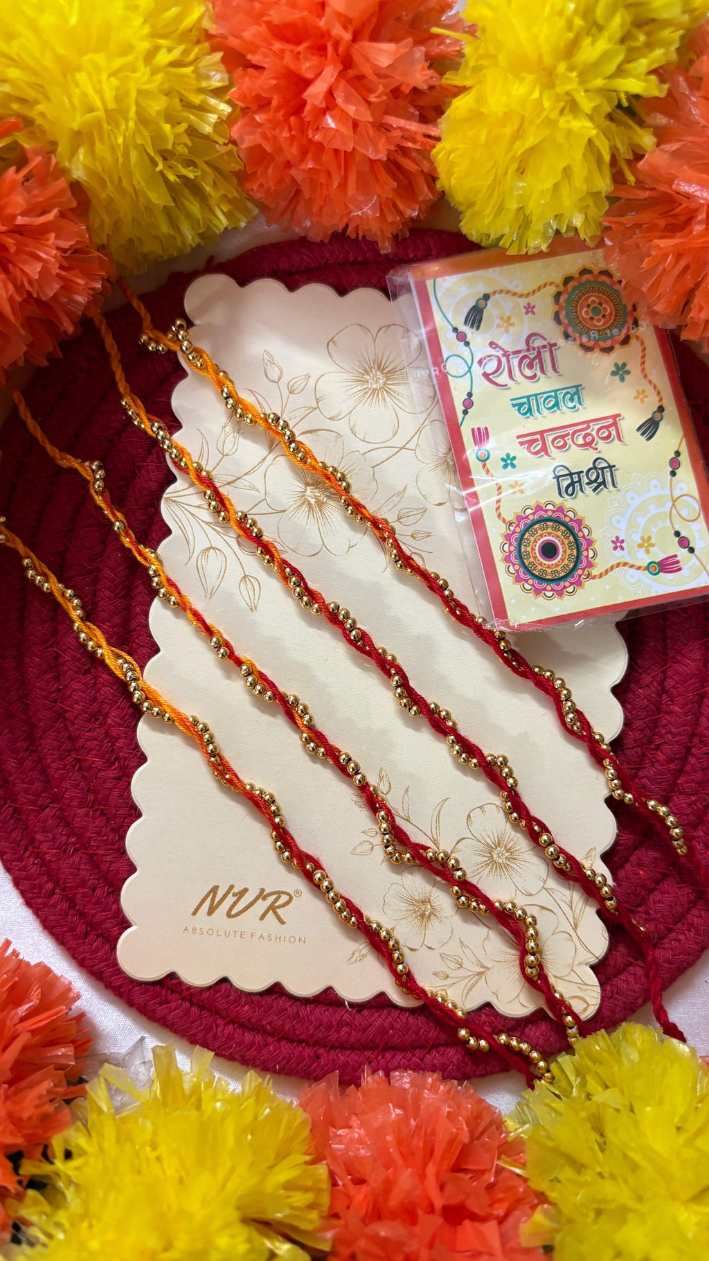 NVR Set of 4 Yellow & Red Thread Rakhi with Roli Chawal Chandan Mishri | Grocsy