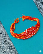 NVR Set of 6 Red & Yellow Thread Rakhi with Roli Chawal Chandan Mishri | Grocsy