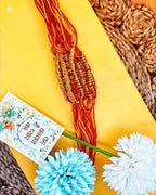 NVR Set of 6 Yellow & Red Thread Rakhi with Roli Chawal Chandan Mishri | Grocsy