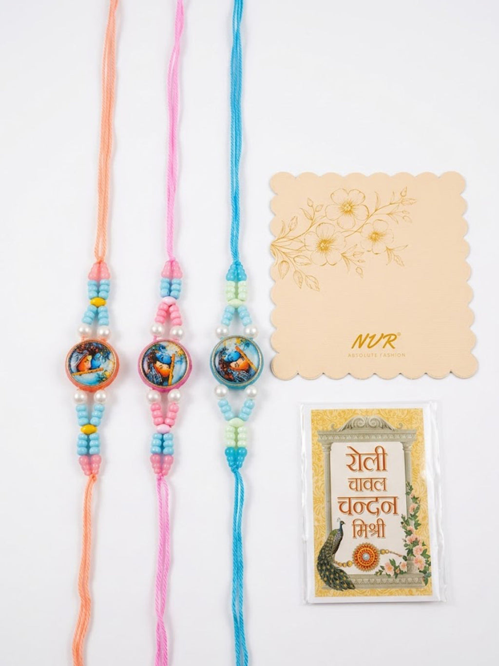 NVR Set of 3 Radha Krishna Thread Rakhi with Roli Chawal Chandan Mishri | Grocsy