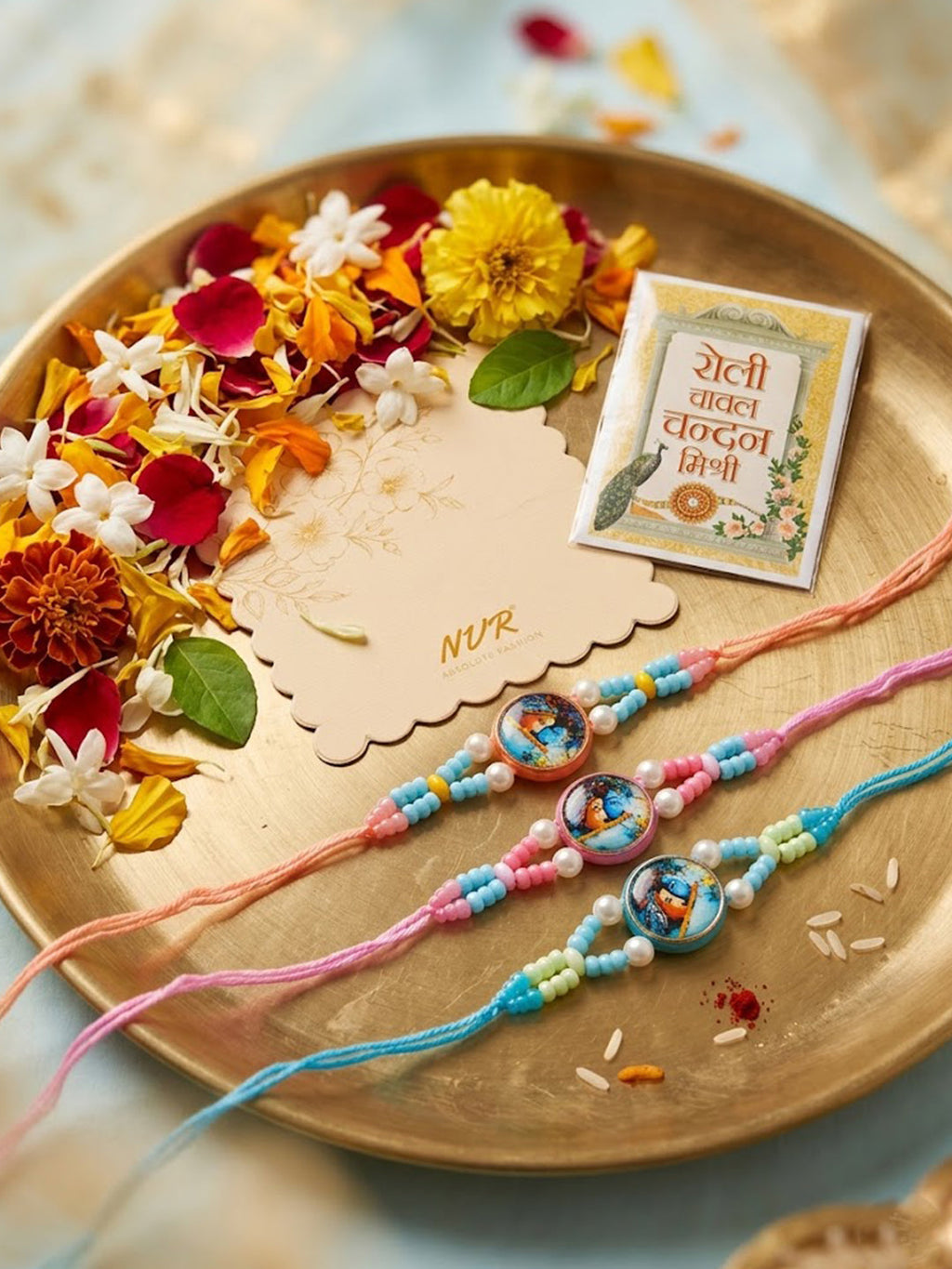 NVR Set of 3 Radha Krishna Thread Rakhi with Roli Chawal Chandan Mishri | Grocsy