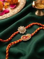 NVR Set of 2 Gold & Red Thread & Kundan Rakhi with Roli Chawal Chandan Mishri | Grocsy