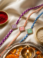 NVR Set of 3 Multicolor AD Thread Rakhi with Roli Chawal Chandan Mishri | Grocsy