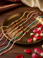 NVR Set of 6 Rudraksh & Artificial Beads Thread Rakhi with Roli Chawal Chandan Mishri | Grocsy