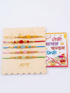 NVR Set of 5 Multi Artificial Beads Thread Rakhi with Roli Chawal Chandan Mishri | Grocsy