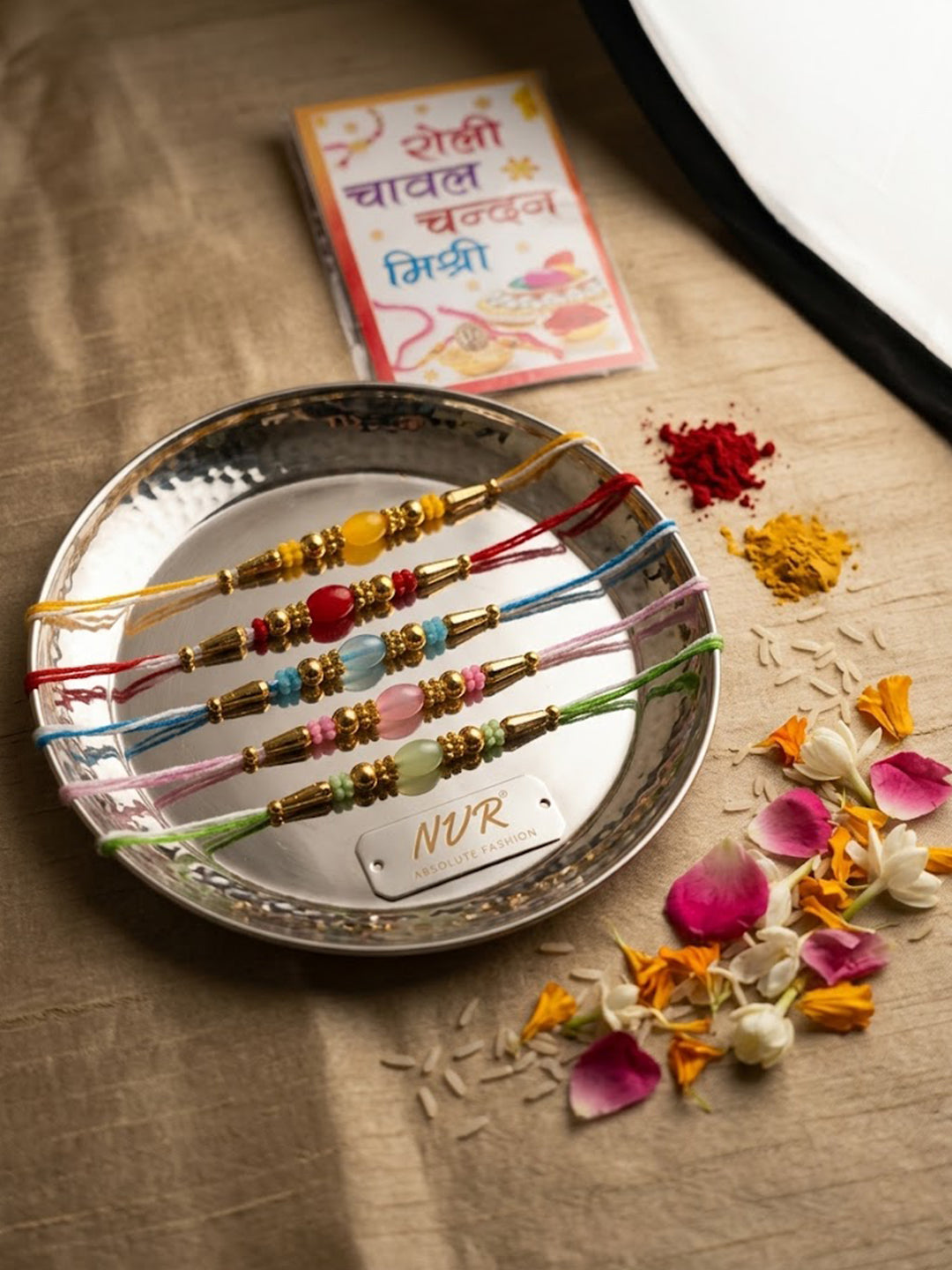 NVR Set of 5 Multi Artificial Beads Thread Rakhi with Roli Chawal Chandan Mishri | Grocsy