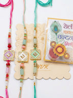 NVR Set of 3 Multicolor AD Thread Rakhi with Roli Chawal Chandan Mishri | Grocsy