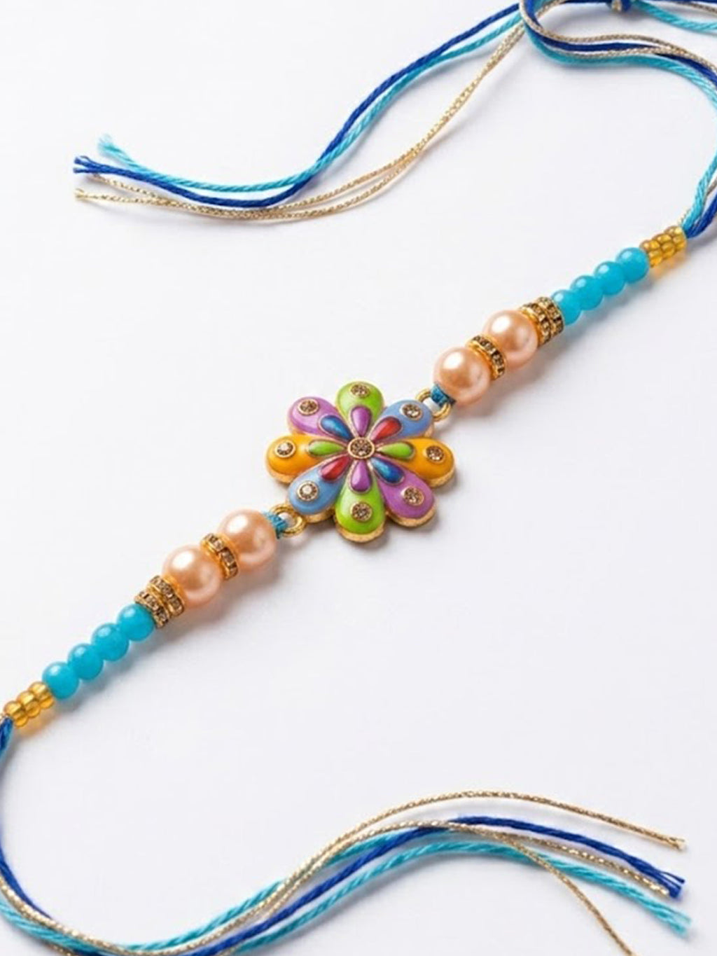 NVR Artificial Beads Flower Shape Multicolor Thread Rakhi with Roli Chawal Chandan Mishri | Grocsy