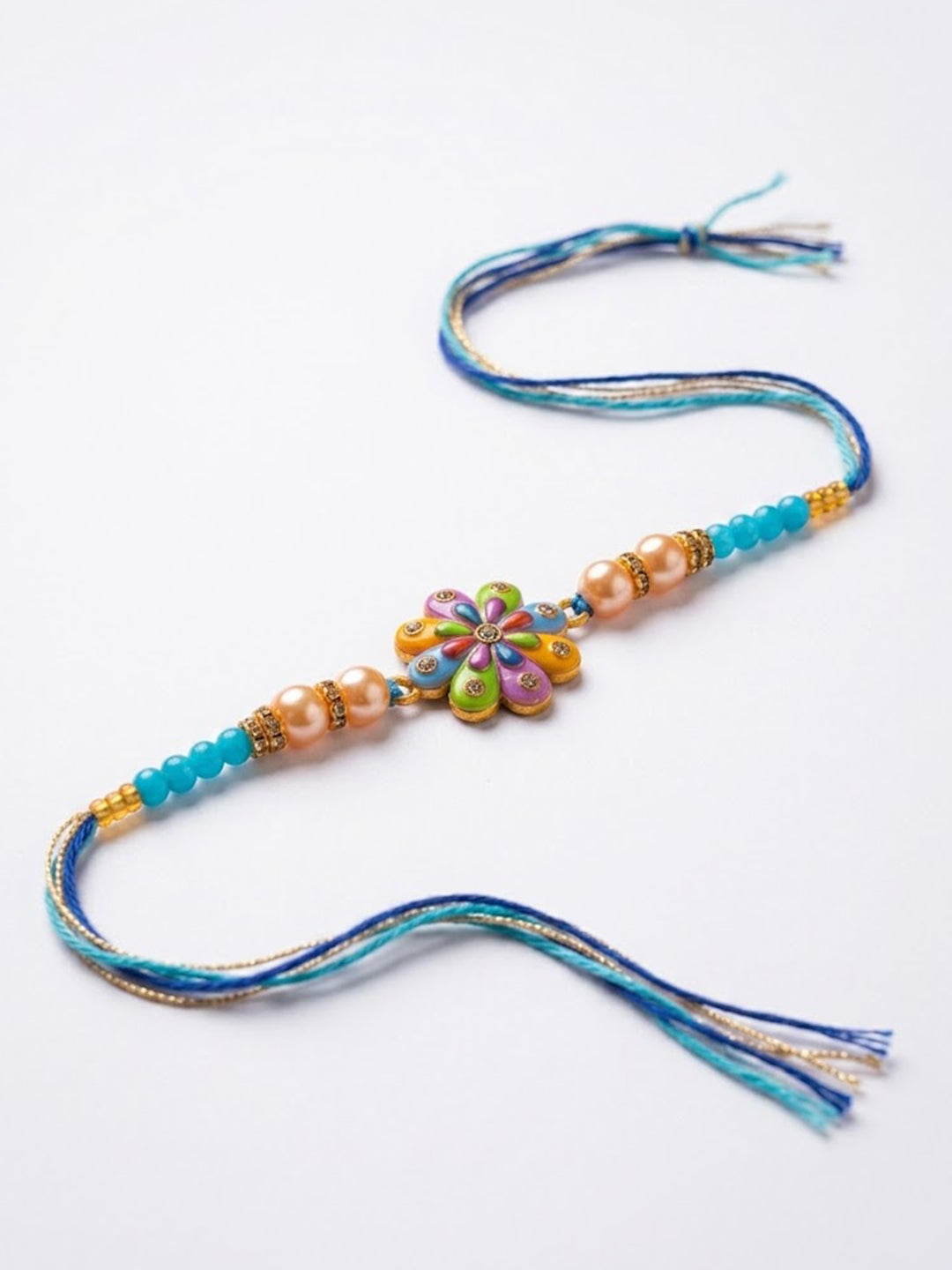 NVR Artificial Beads Flower Shape Multicolor Thread Rakhi with Roli Chawal Chandan Mishri | Grocsy