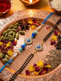 NVR Set of 2 Blue Evil Eye Artificial Stones Bhaiya Bhabhi Rakhi with Roli Chawal Chandan | Grocsy
