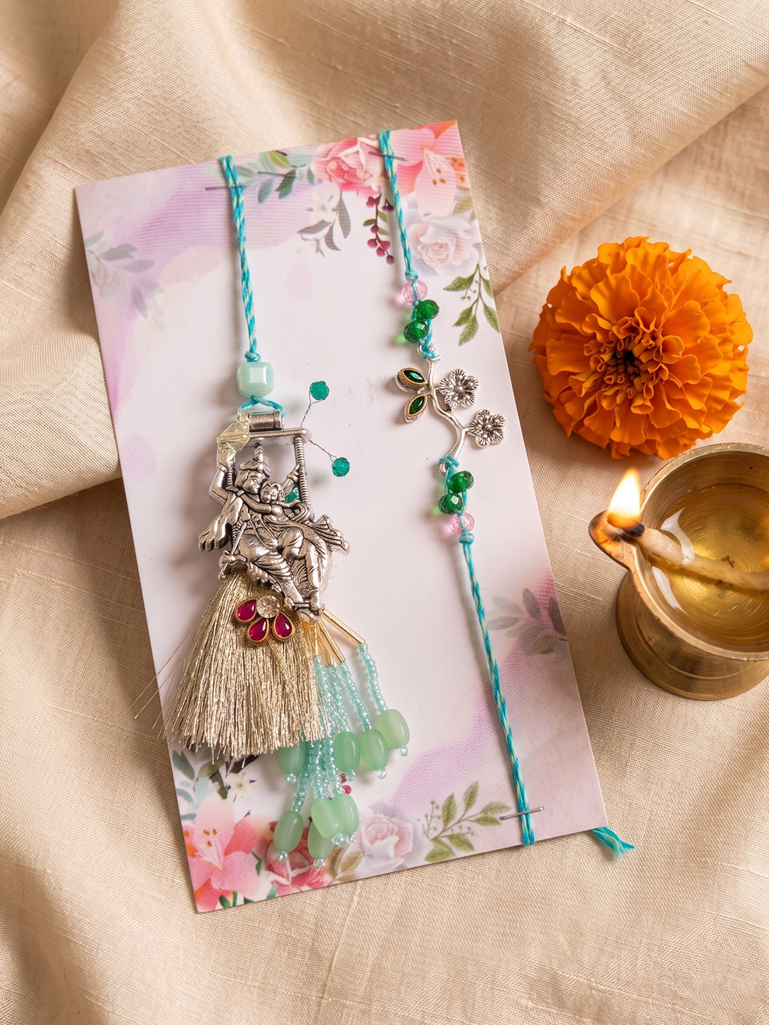 NVR Set of 2 Designer Religious Silver Toned Bhaiya Bhabhi Rakhi with Roli Chawal Chandan | Grocsy