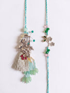 NVR Set of 2 Designer Religious Silver Toned Bhaiya Bhabhi Rakhi with Roli Chawal Chandan | Grocsy