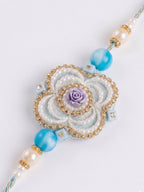 NVR Set of 2 Pearls & Artificial Stones Floral Bhaiya Bhabhi Rakhi with Roli Chawal | Grocsy