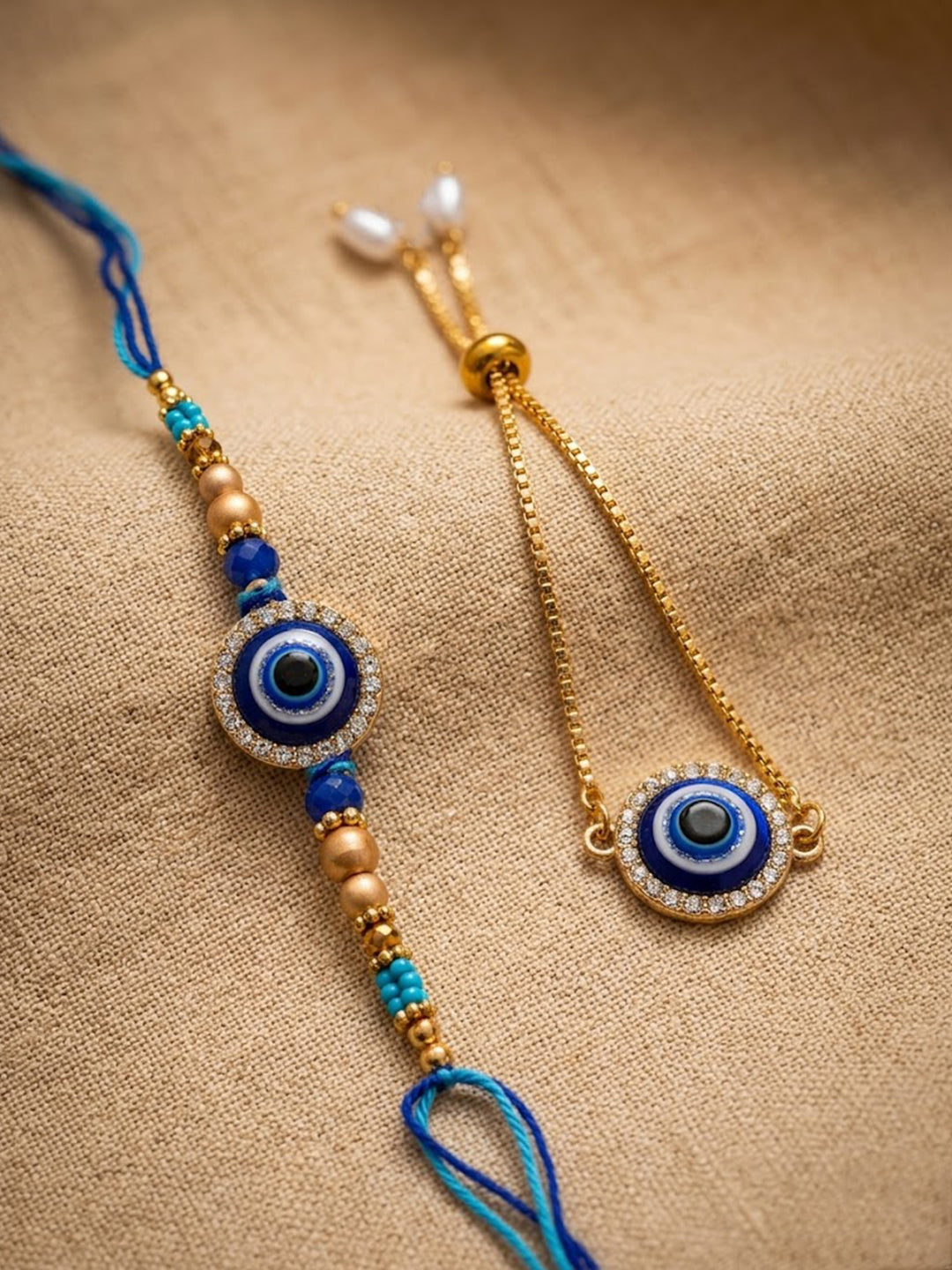 NVR Set of 2 Blue Evil Eye Gold Toned Bhaiya Bhabhi Rakhi with Roli Chawal Chandan Mishri | Grocsy