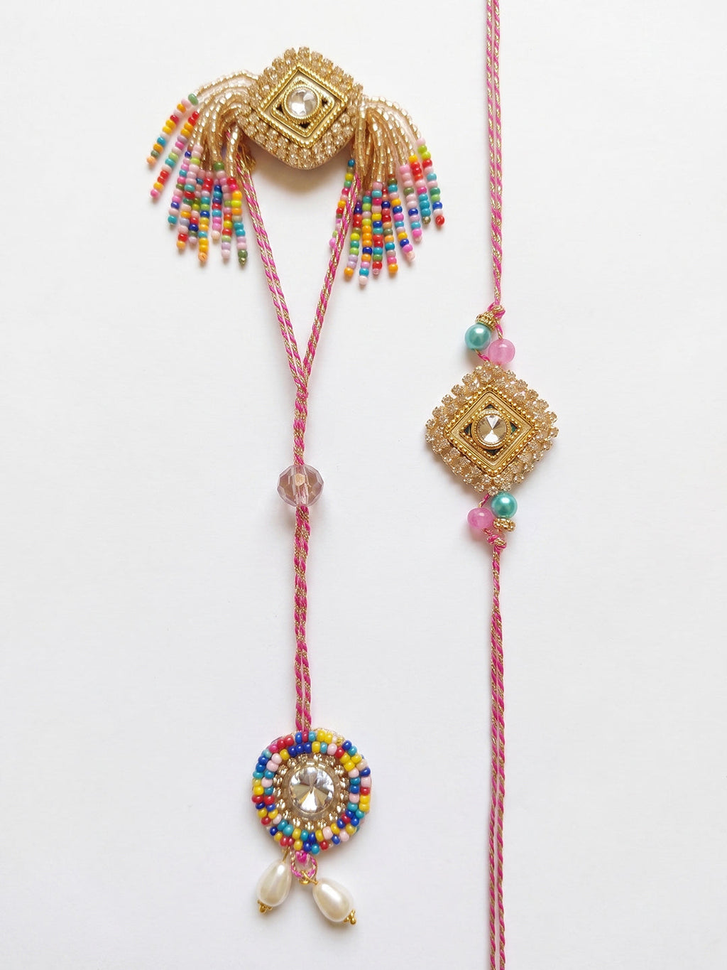 NVR Set of 2 White Artificial Stones Golden Toned Bhaiya Bhabhi Rakhi With Roli Chawal | Grocsy