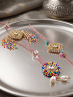 NVR Set of 2 White Artificial Stones Golden Toned Bhaiya Bhabhi Rakhi With Roli Chawal | Grocsy
