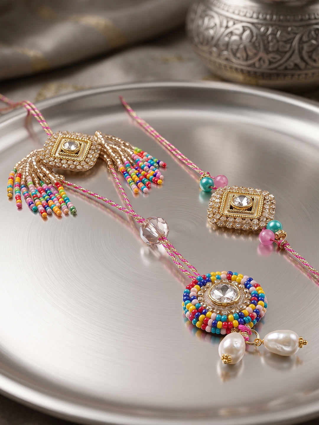 NVR Set of 2 White Artificial Stones Golden Toned Bhaiya Bhabhi Rakhi With Roli Chawal | Grocsy