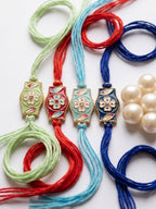 NVR Set of 4 Multicolor Heart Shape Thread Rakhi with Roli Chawal Chandan Mishri | Grocsy
