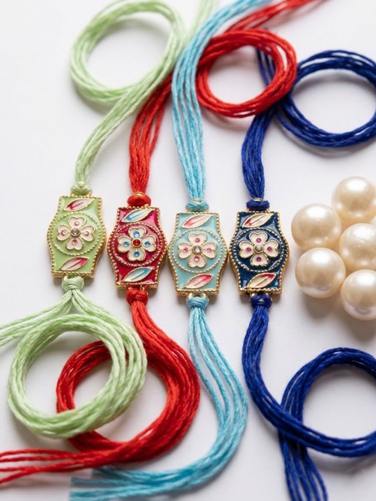 NVR Set of 4 Multicolor Heart Shape Thread Rakhi with Roli Chawal Chandan Mishri | Grocsy