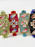 NVR Set of 4 Multicolor Heart Shape Thread Rakhi with Roli Chawal Chandan Mishri | Grocsy