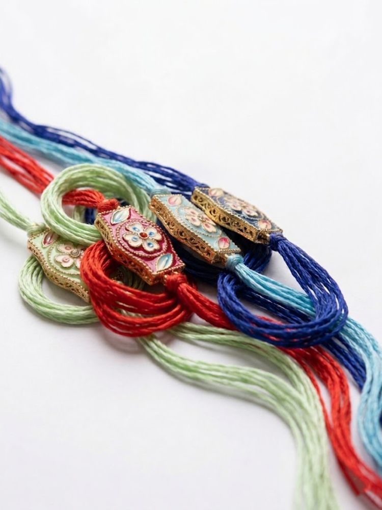 NVR Set of 4 Multicolor Heart Shape Thread Rakhi with Roli Chawal Chandan Mishri | Grocsy