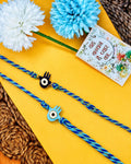 NVR Set of 2 Evil Eye & Blue Thread Rakhi with Roli Chawal Chandan Mishri | Grocsy